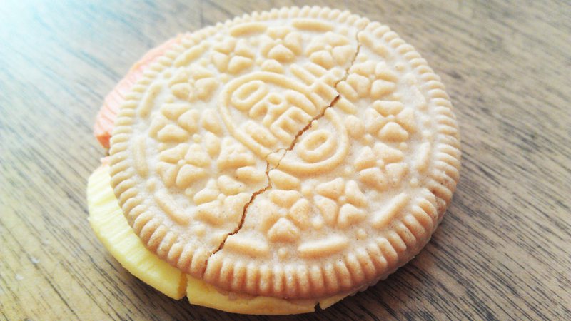 Illustration for article titled Taste Test: I Took a Candy Corn Oreo and Put It in My Mouth